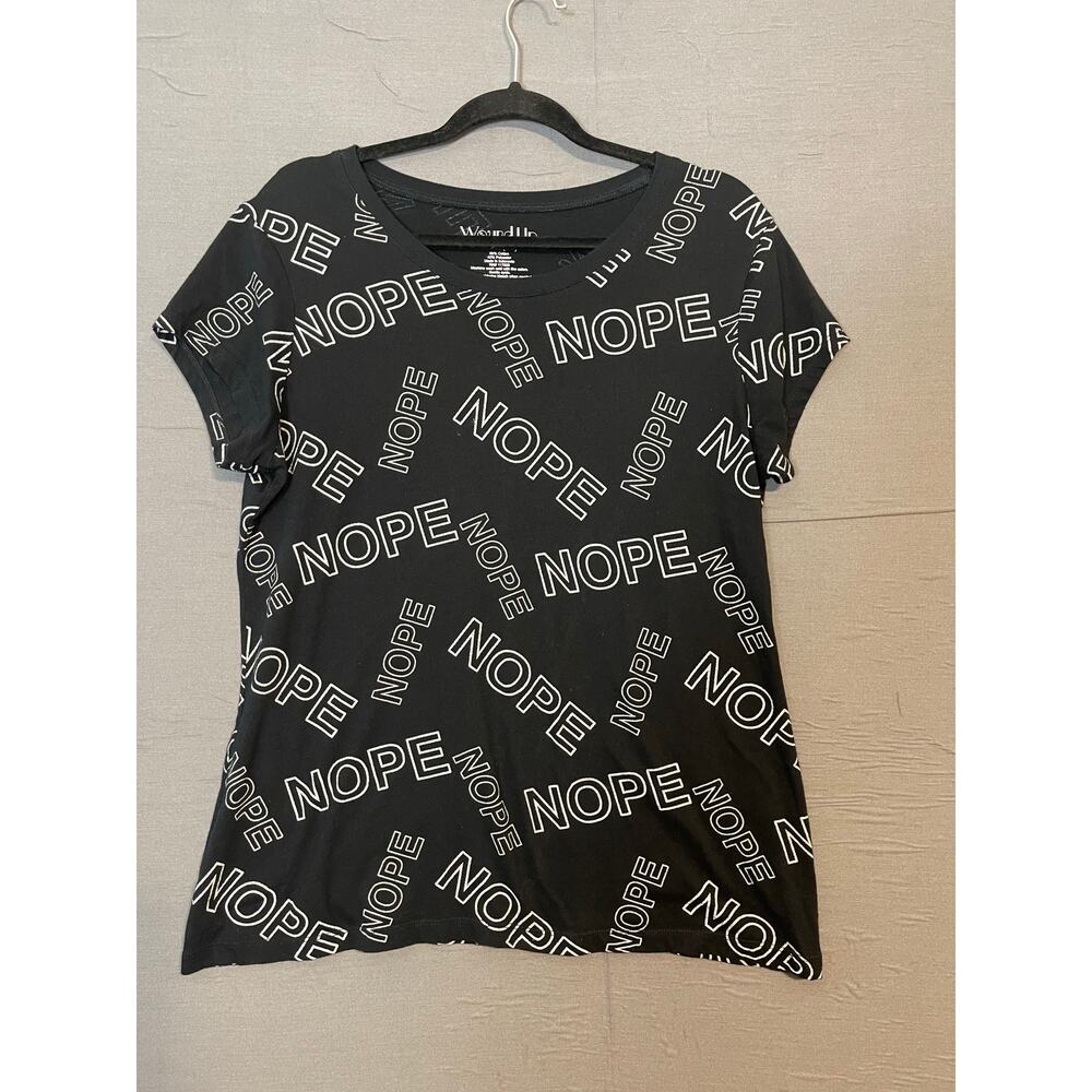 Wound up woman TShirt size XXXL (21) with “NOPE” print on it